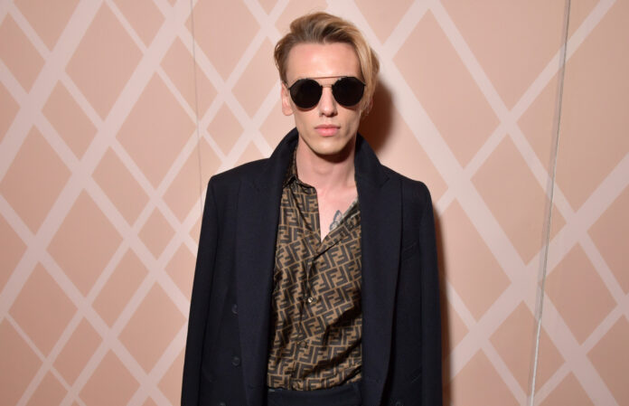 Jamie Campbell Bower at the Fendi show at Milan Fashion Week in 2018