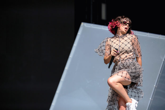 Charli XCX performs in 2019.