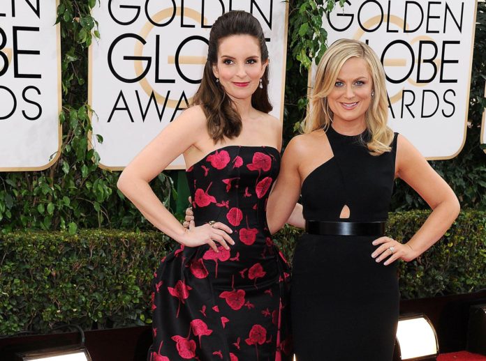 Tina Fey and Amy Poehler at the 71st Annual Golden Globe Awards