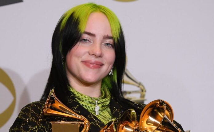 Billie Eilish with her Grammys for Album of the Year, Best New Artist, Best Pop Solo Performance, Best Pop Vocal Album, and Record of the Year at the Grammy Awards in January 2020.