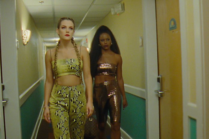 Riley Keough and Taylour Paige in 