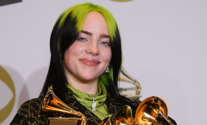 Billie Eilish with her Grammys for Album of the Year, Best New Artist, Best Pop Solo Performance, Best Pop Vocal Album, and Record of the Year at the Grammy Awards in January 2020